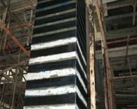 What is the performance of carbon fiber cloth used in building reinforcement projects?